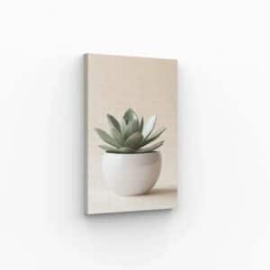 Tableau d’une plante verte dans un pot blanc moderne, idéal pour une décoration murale minimaliste et apaisante.