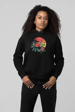 Hoodie floral exotique noir avec un design tropical coloré, idéal pour un look tendance et confortable.